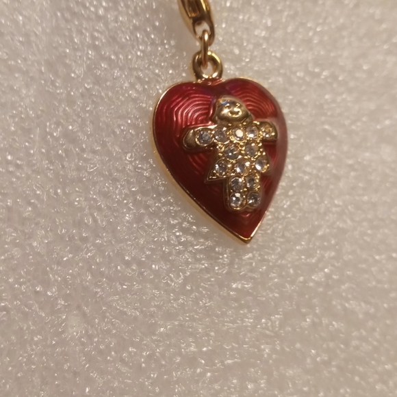 Faberge egg charm bracelet on a gold tone rolo chain. - Picture 10 of 16